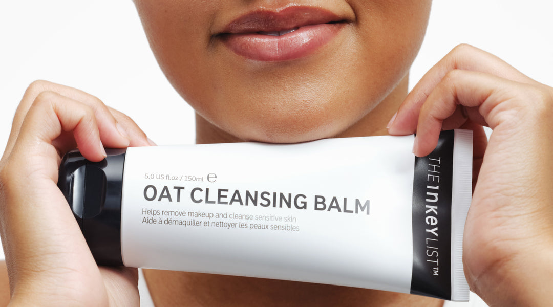 Model holding oat cleansing balm