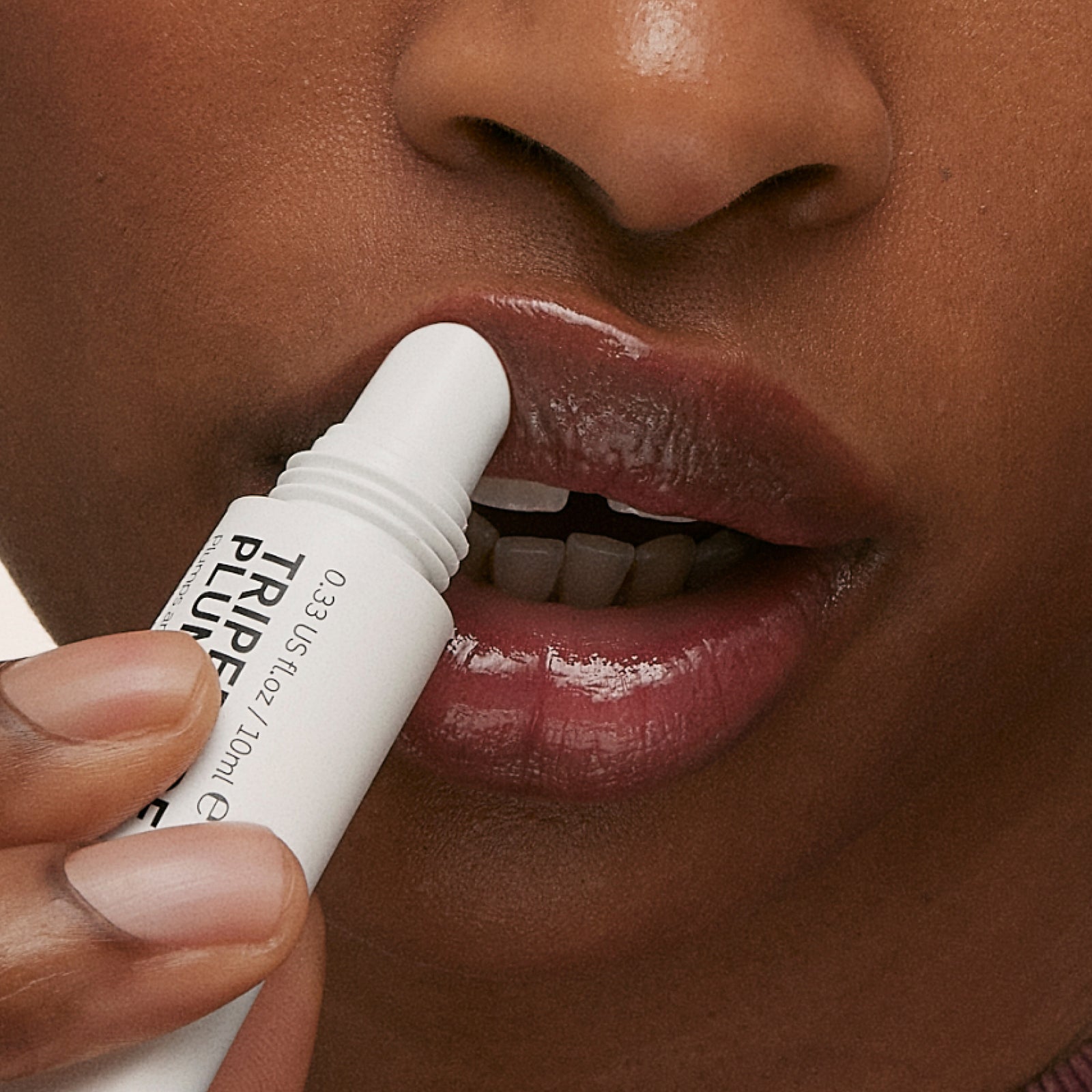 Model appying Berry Tripeptide Lip