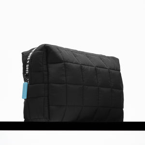 INKEY Wash Bag on black shelf
