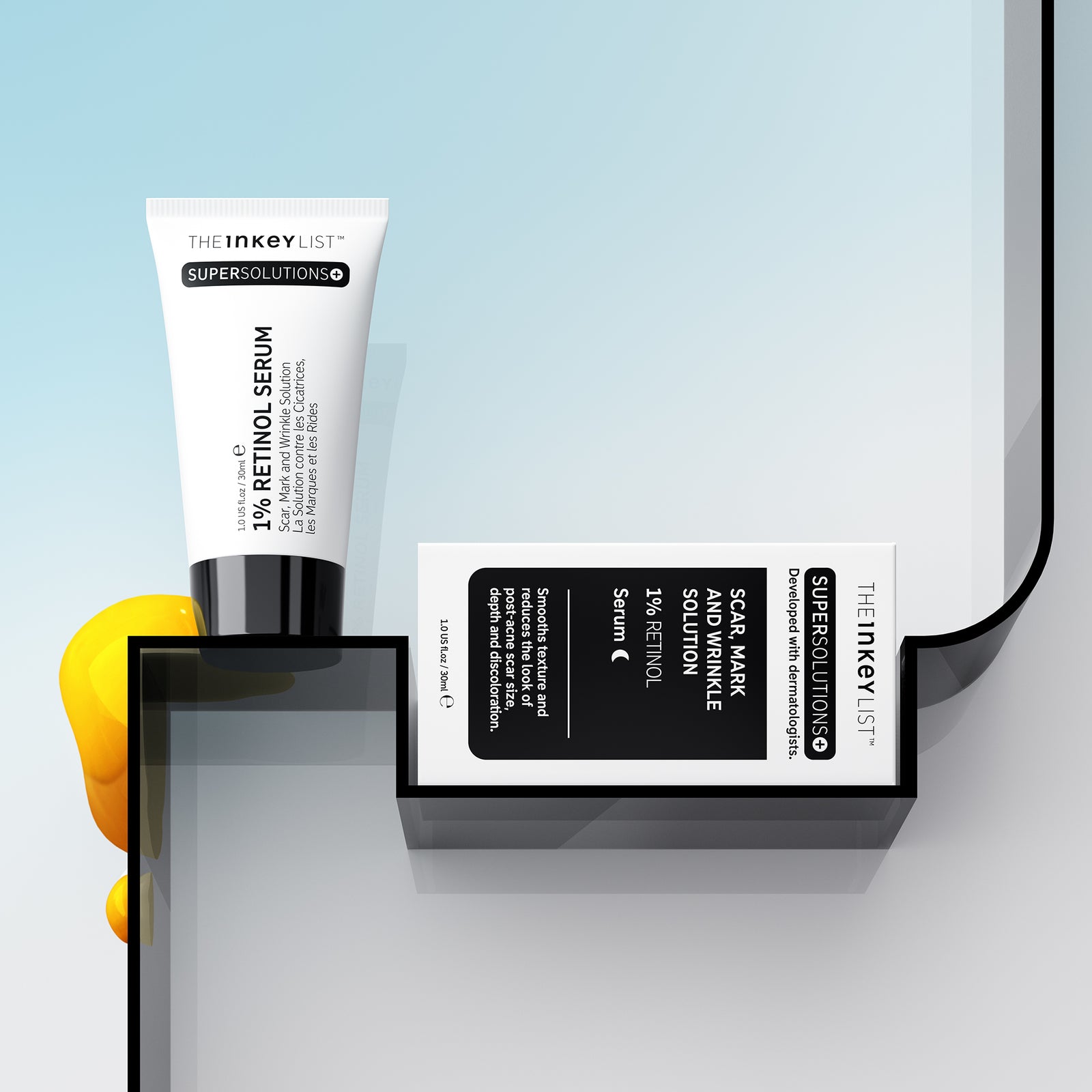 Scar, Mark & Wrinkle Solution tube and outer packaging on a black shelf against blue gradient background with yellow goop