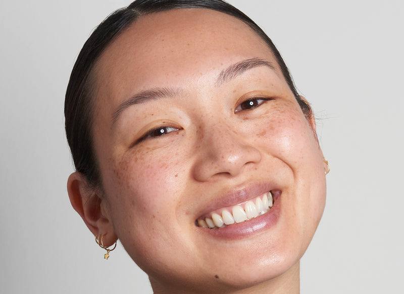Model using The INKEY List as part of her dry skincare routine