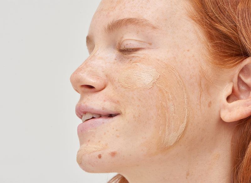 Model with serum on her face