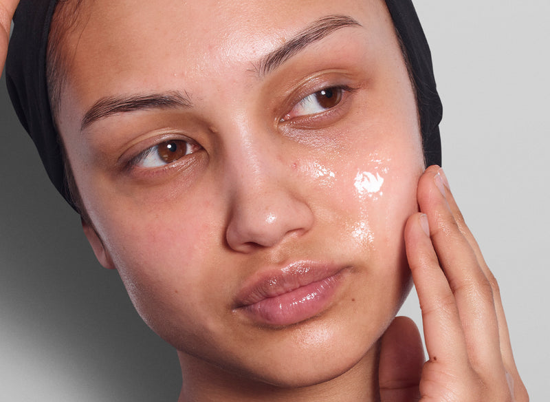 Model applying skincare