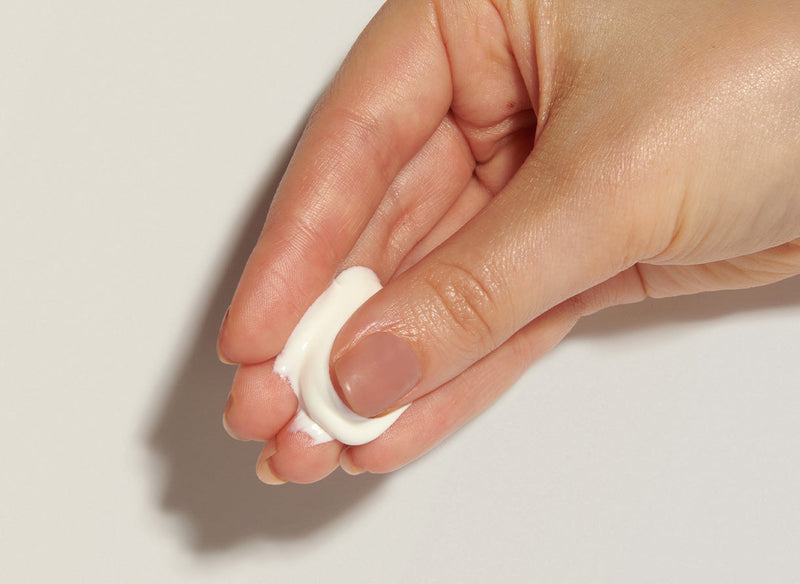 How to Layer Skincare hand shot with product 