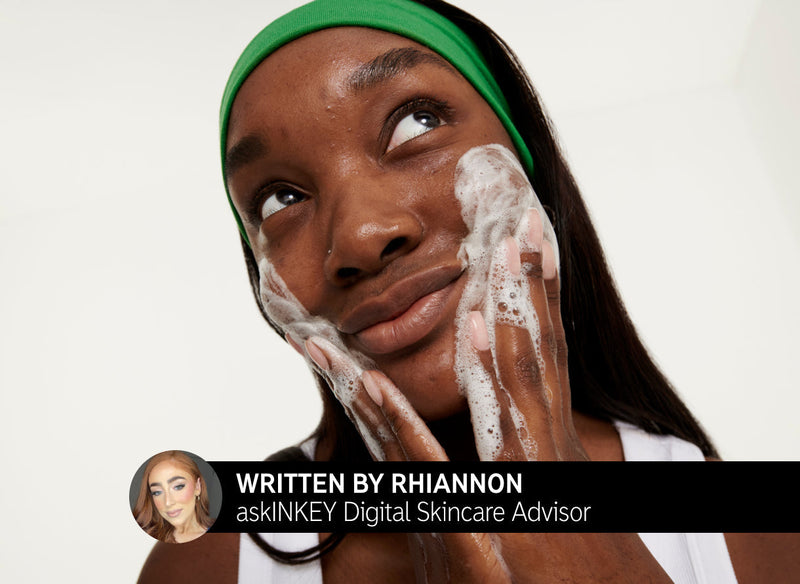 Model washing her face with Cleanser. Written by Rhiannon. askINKEY Digital Skincare Advisor