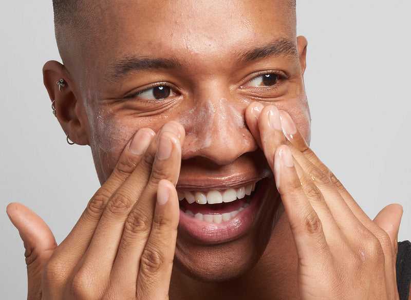 Model using The INKEY List products as part of their essential skincare routine