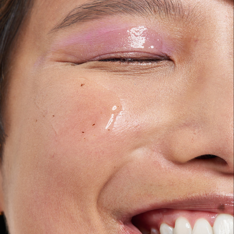 Model with serum on their cheek