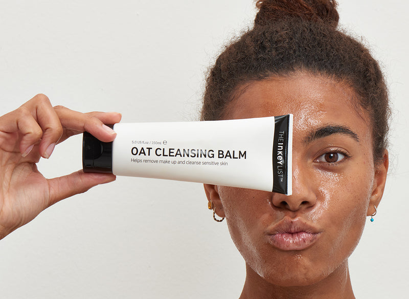 Woman holding Oat Cleansing Balm