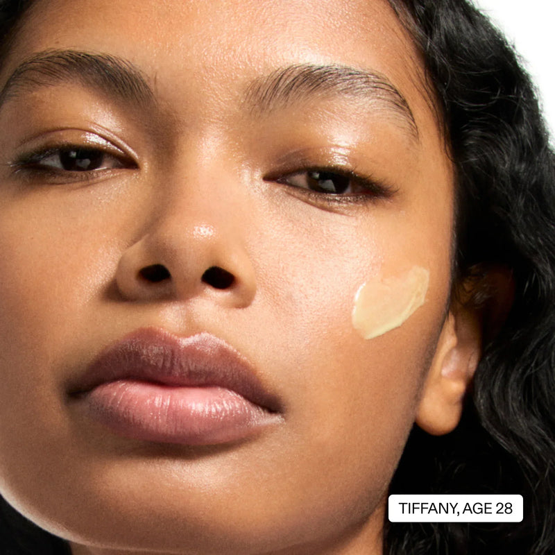 woman with retinol on her face
