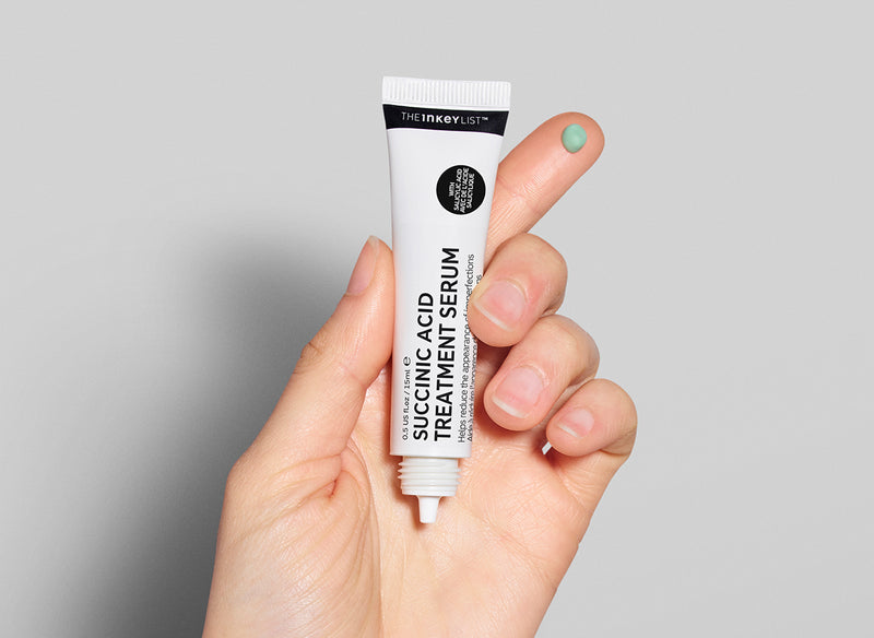 Succinic Acid on fingertip