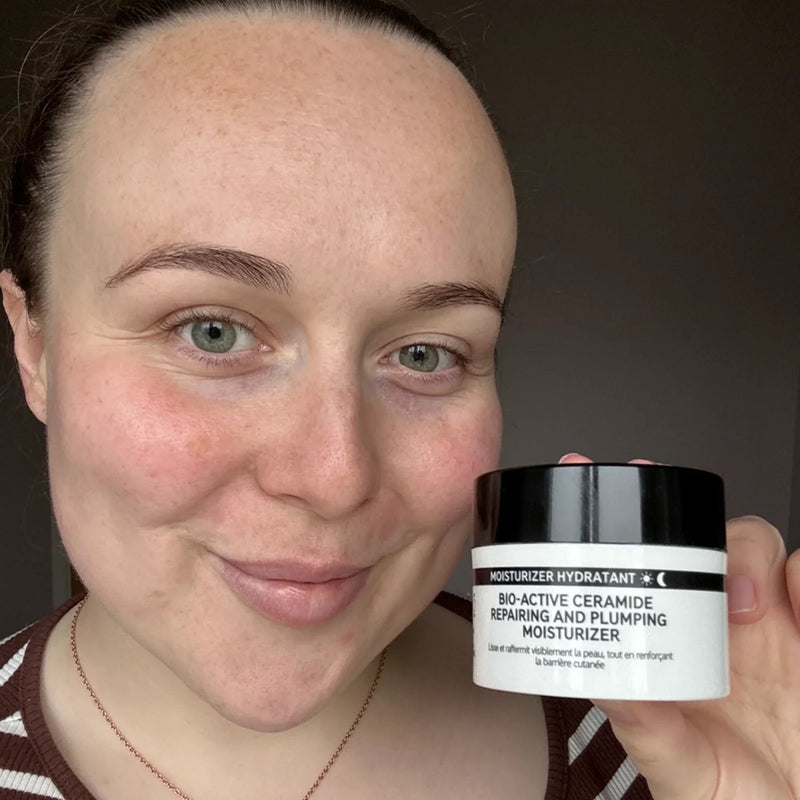 woman holding bio active moistutiser