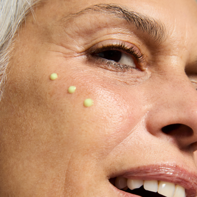 woman with cream on her face