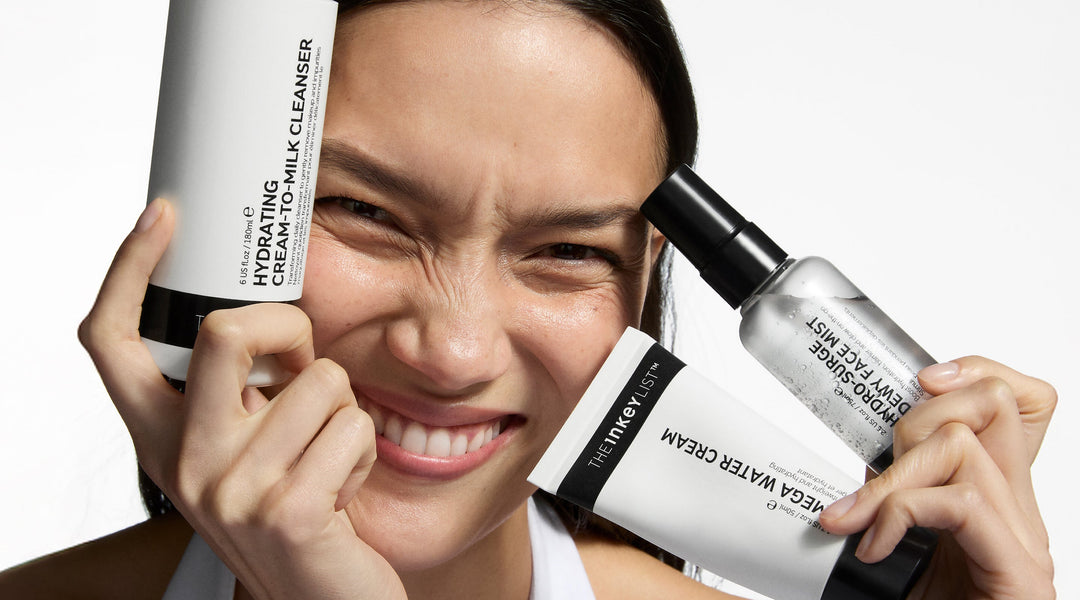 Model holding bottle of Hyaluronic Acid Serum