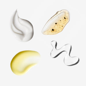 Four different swatches of cream on a white background