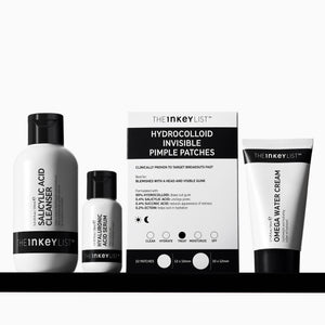 The Inkey List skincare products including cleanser, serum, patches, and cream on a white background