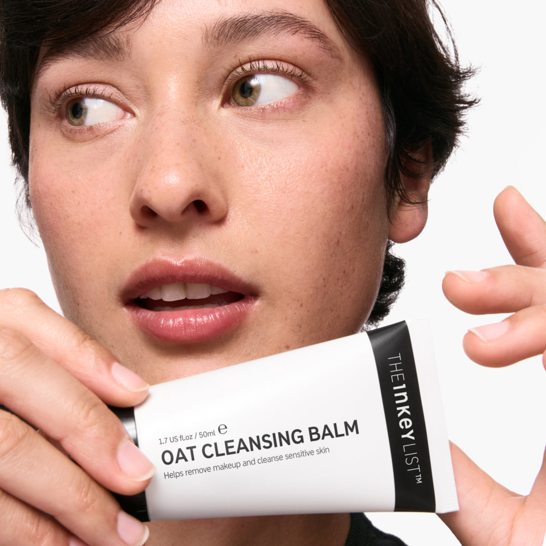 Model holding oat cleansing balm 150ml