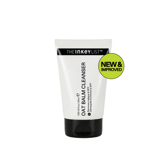 Tube of The INKEY List Oat Balm Cleanser with a 'New & Improved' label on a white background