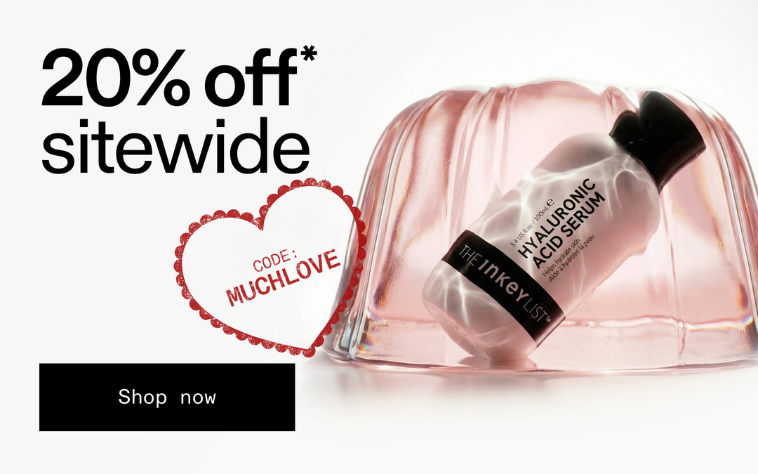 Skincare product in a pink packaging with promotional text and code on a white background