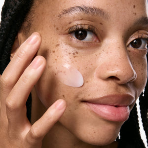 Model with Vitamin B, C and E Moisturizer on her face