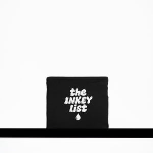 Black pouch with 'the INKEY list' text on a white background