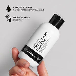 Hand holding Salicylic Acid Cleanser bottle with text 'Amount to apply (small raspberry sized amount)' and 'When to apply (AM and PM)'