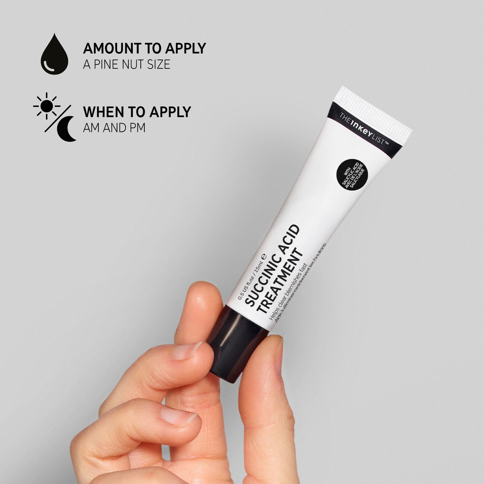 Hand holding a tube of Succinic Acid Treatment with text overlay: amount to apply (pine nut sized) and when to apply (AM and PM)